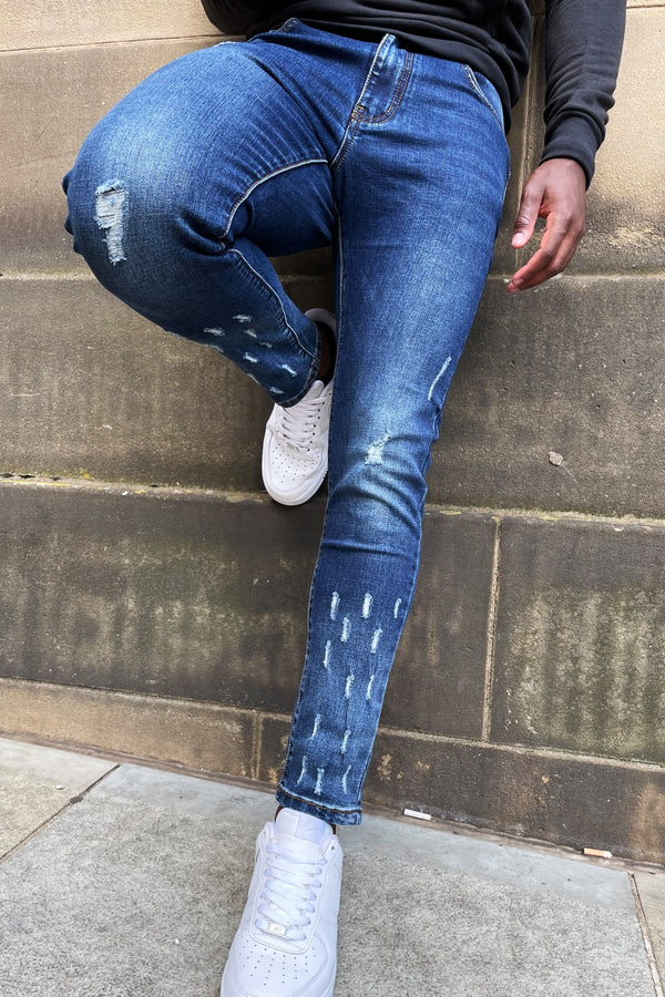 Blue Skinny Jeans with Raw Hem and Knee Rip 