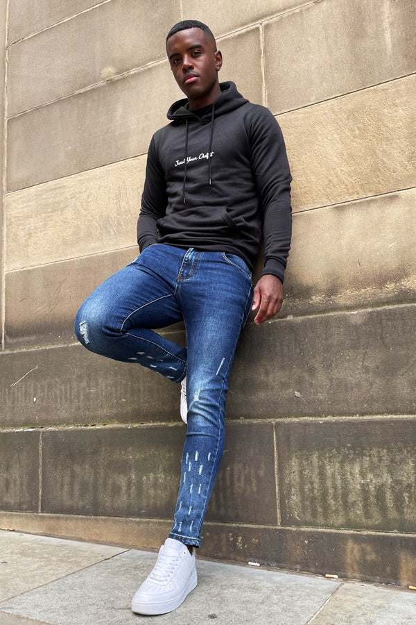 Blue Skinny Jeans with Raw Hem and Knee Rip 