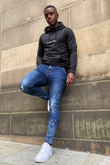 Blue Skinny Jeans with Raw Hem and Knee Rip 