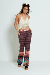 Orange Printed Flare Leg Trousers