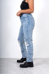 Light blue ripped knee mom jeans 