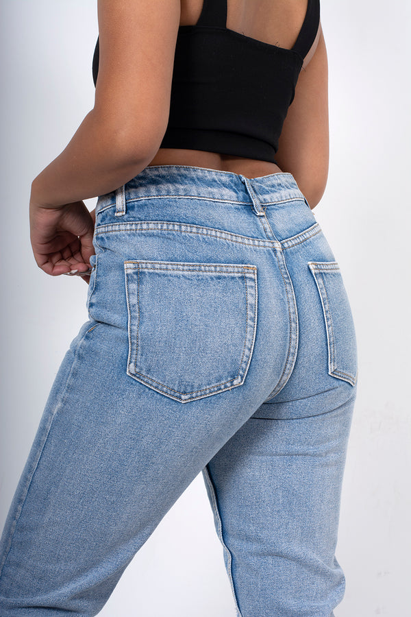 Light blue ripped knee mom jeans 