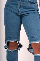 Dark blue ripped knee love hate mom jeans